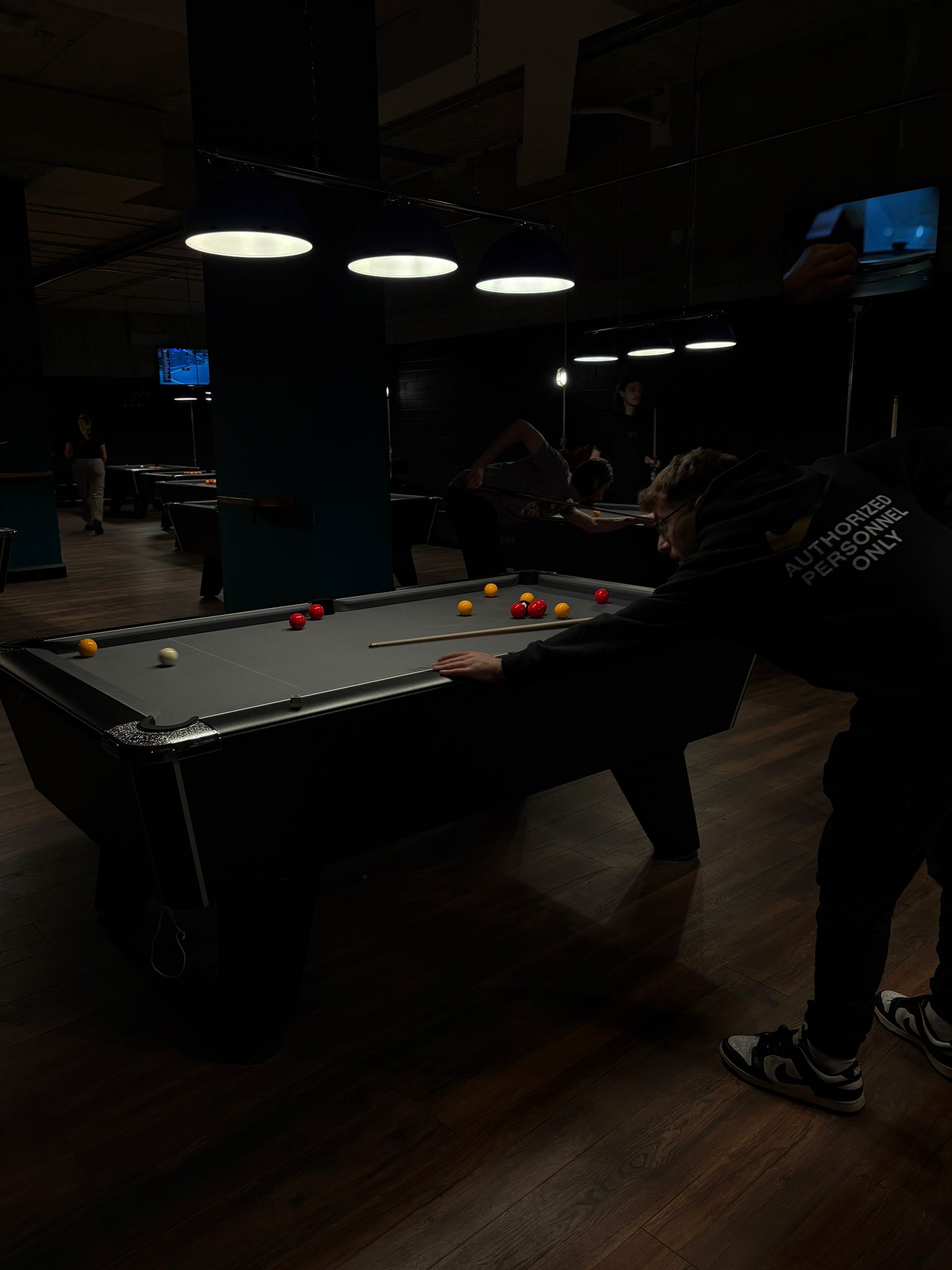 A player lining up a shot at The Breakroom